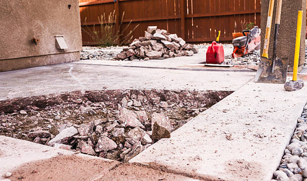 istock Partially removed concrete patio. Home construction and renovation 612625296