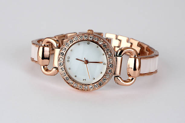 istock Gold watch with rhinestones . 612627400