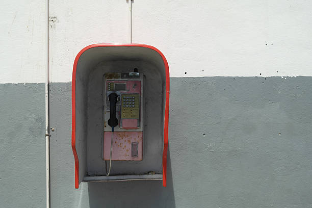 istock Old public payphone on Praslin island - Seychelles 612628042