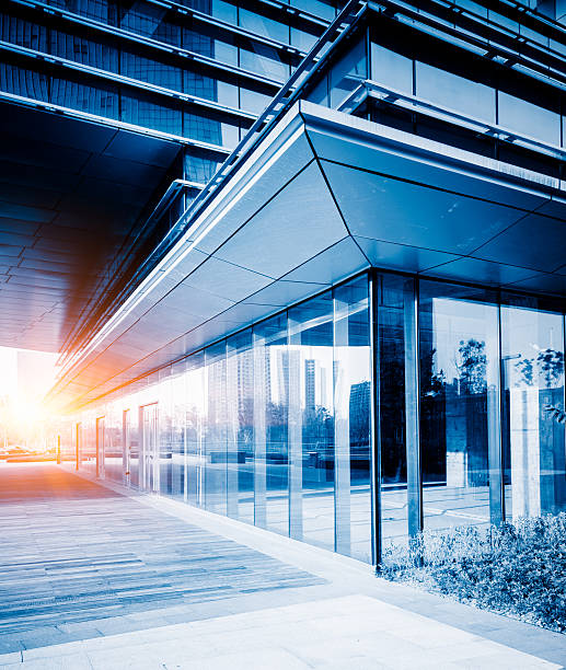 istock empty brick road nearby office building 612629192