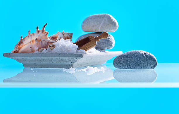 istock Sea salt on a glass table 612629772