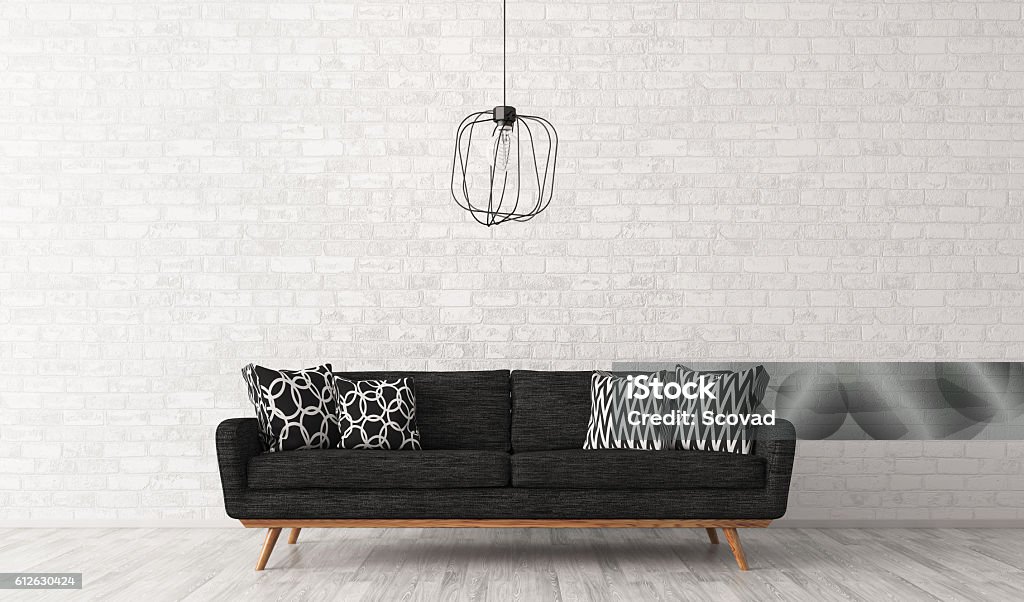 Interior of living room with sofa 3d rendering Modern interior of living room with black sofa and lamp against of white brick wall 3d rendering Sofa Stock Photo