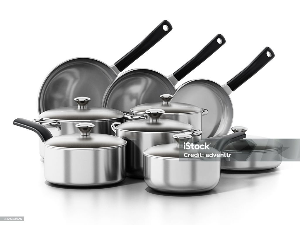 Cooking and frying pans set isolated on white. Stainless steel cooking and frying pans set isolated on white. Cooking Pan Stock Photo