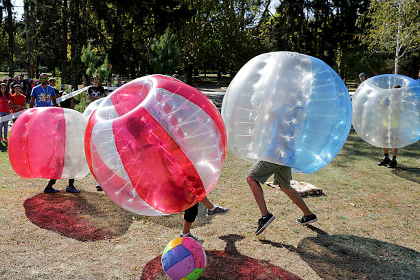 пузырь футбольный матч - bubble ball стоковые фото и изображения