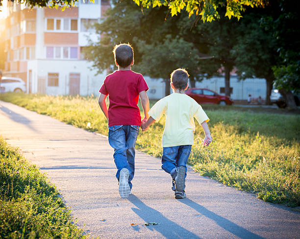 9,700+ Kids Running Away Stock Photos, Pictures & Royalty-Free Images