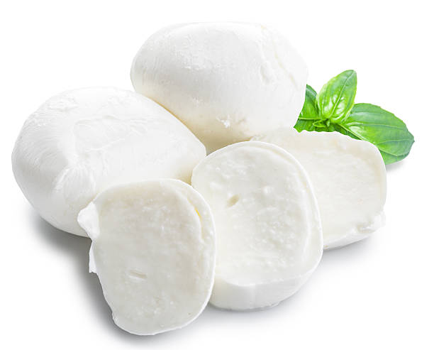 Mozzarella and basil. Mozzarella and basil. White background. mozzarella stock pictures, royalty-free photos & images