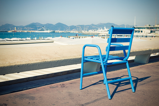 Blue chair in the Croisette, Cannes, French Riviera
