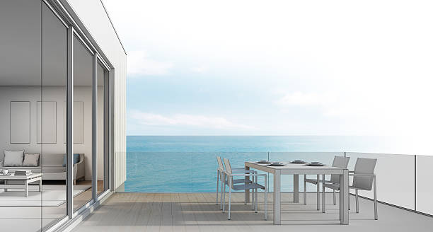 istock Beach house sketch design, Outdoor dining with sea view 612634726