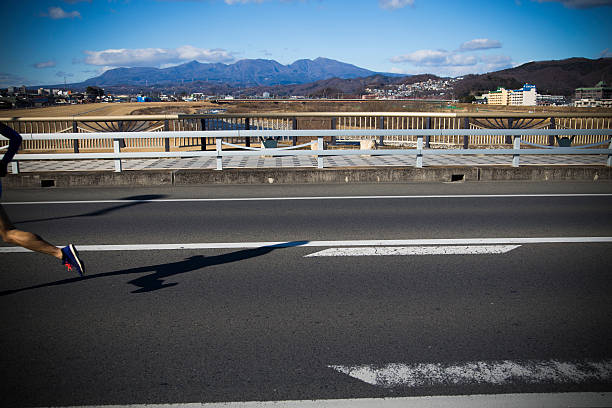 The person who runs on the bridge.