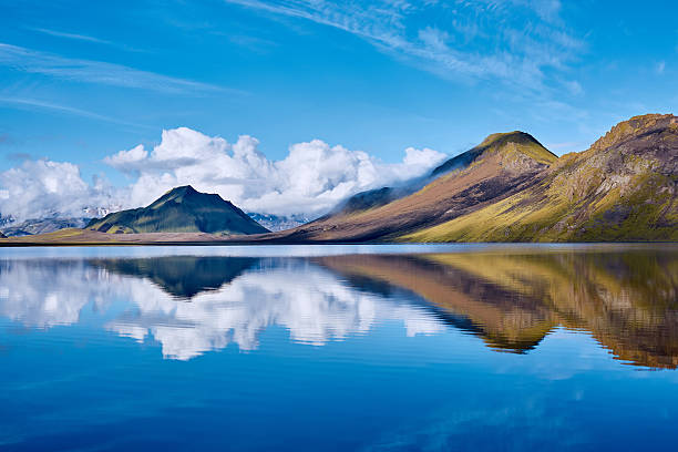 istock Lake coast with mountain reflection, Iceland 612635302