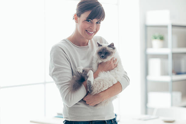 istock Happy woman with her pet 612639632