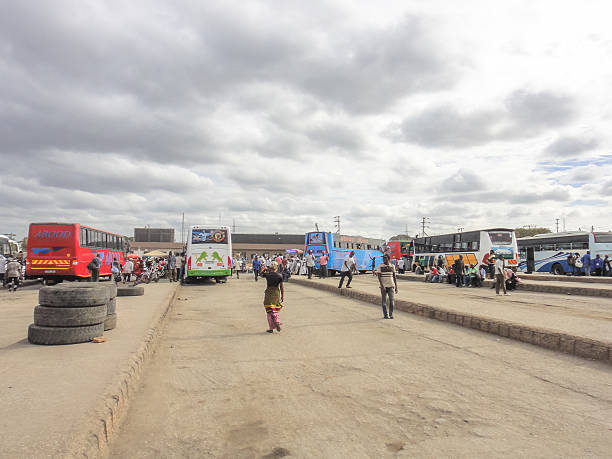 Ubungo bus terminal near Dar es Salaam Dar es Salaam, Tanzania - September 10, 2013: People at Ubungo bus terminal in the suburb of Dar es Salaam in Tanzania. Eastern Africa xxi stock pictures, royalty-free photos & images