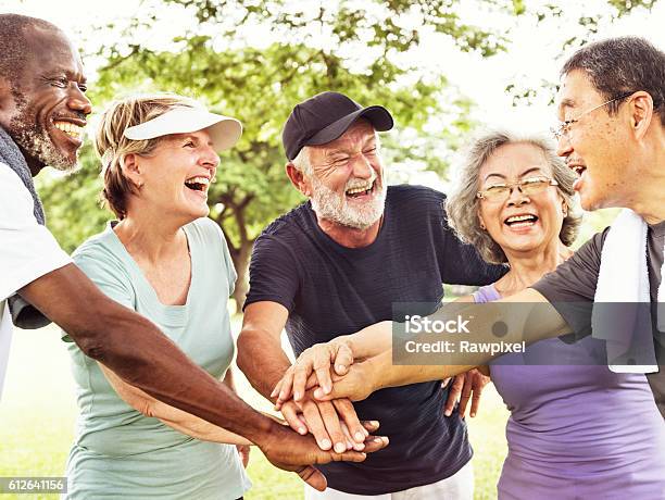 Group Of Senior Retirement Exercising Togetherness Concept Stock Photo - Download Image Now