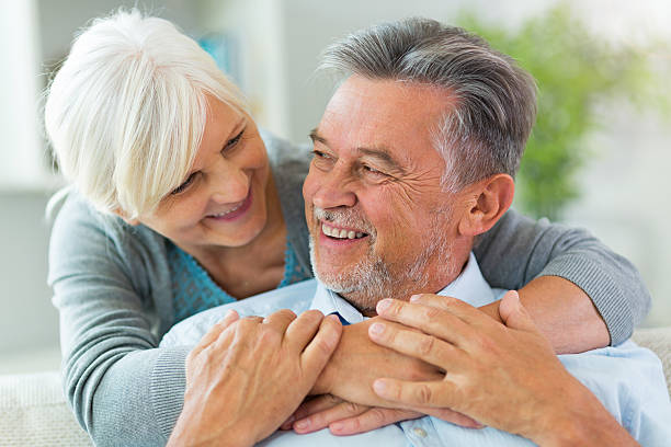 istock Senior couple embracing 612644060