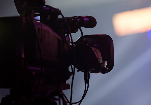 istock tv camera in a concert hall 612645454