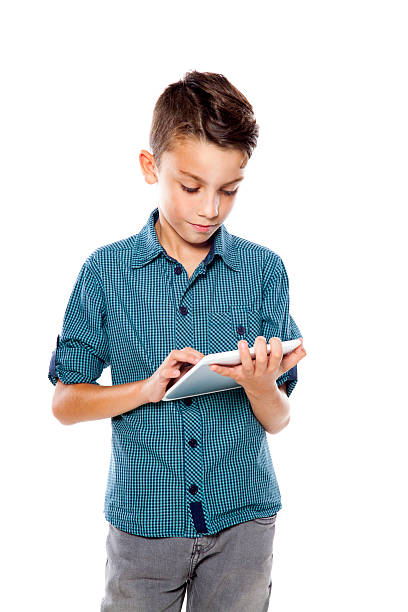 istock teenage boy with digital tablet 612646078