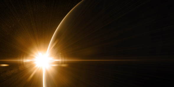 Sunrise in space with prominent sun flare and sun streaks. Golden, orange and yellow color scheme.Elements of this image furnished by NASA. 3d illustration