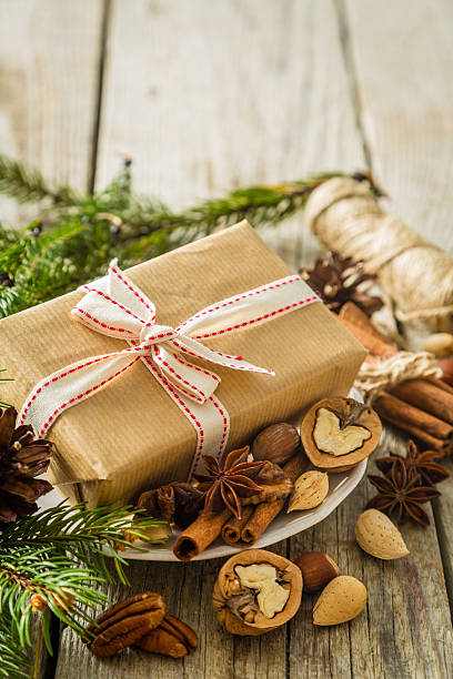 istock Christmas preasent nuts cinnamon ribbon 612647132