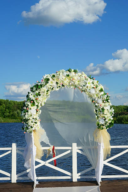 istock arch of flowers at the wedding 612649256
