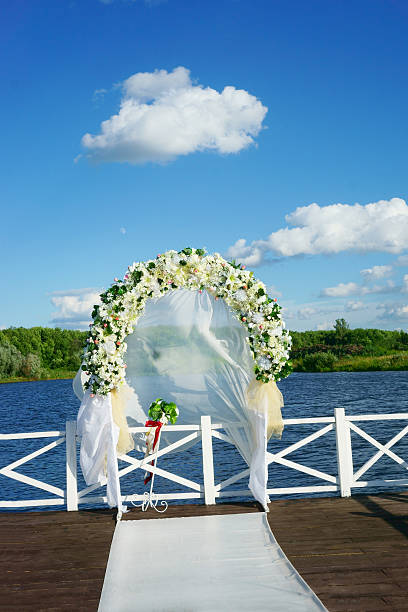 istock arch of flowers at the wedding 612649302
