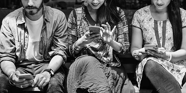 istock Indian Ethnicity Casual Cheerful Friends Mobile Concept 612649498