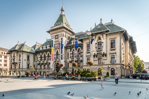 Craiova, Dolj County, Romania - June 3, 2014: Headquarters of Dolj County Prefecture in the city of Craiova, Romania. The building was designed by the architect Petre Antonescu between 1912-1913.