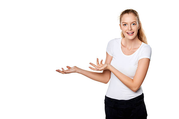 istock Smiling woman showing blank copy space 612653384