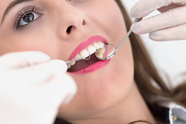 istock Young patient at the dentist 612654472