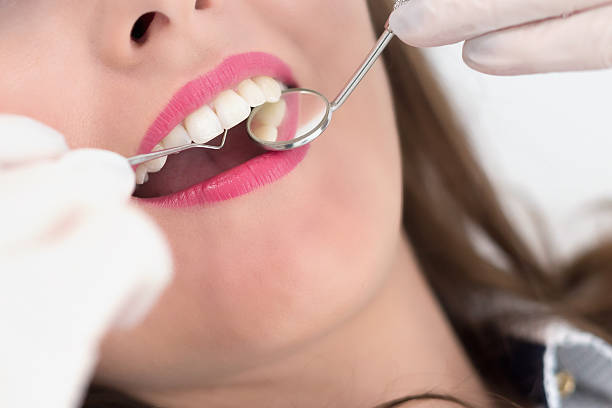 istock Young patient at the dentist 612654492