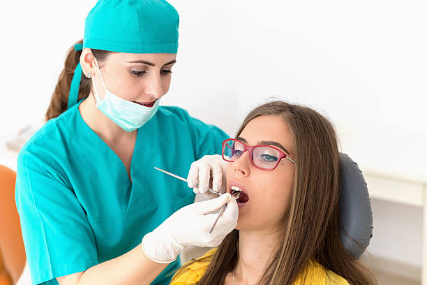 istock Young patient at the dentist 612654896