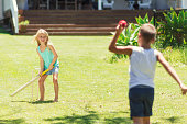 istock Australian kids playing cricket 612655644