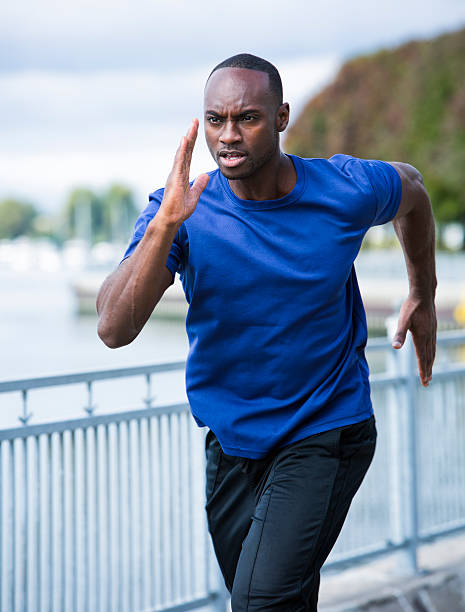 istock young man running outdoors 612656428