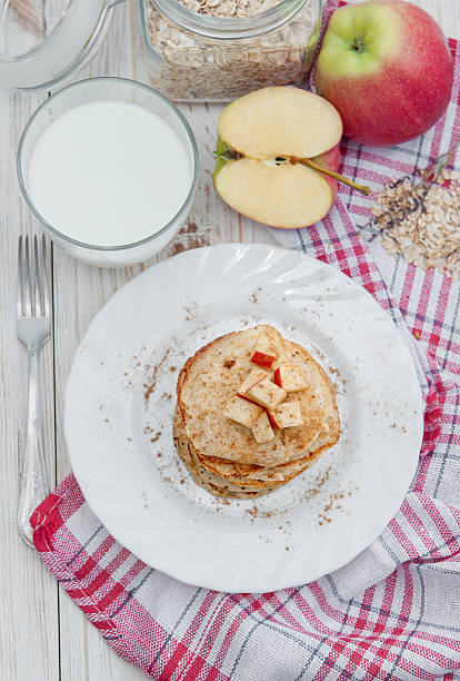 Oatmeal pancakes with apple and honey.