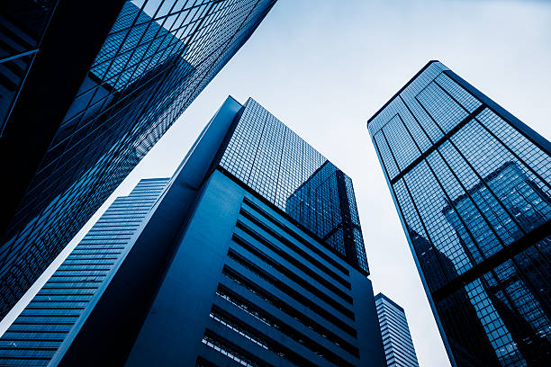 istock low angle view of modern metallic skyscrapers,suzhou 612659082