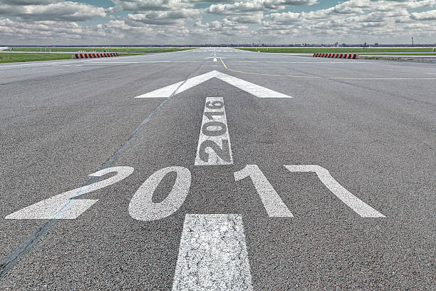 istock Arrow runway airport year 2016 to 2017 612660020