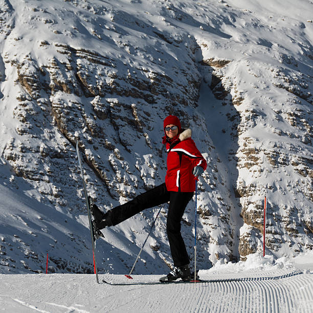 istock skier in red equipment in the Alps 612660458