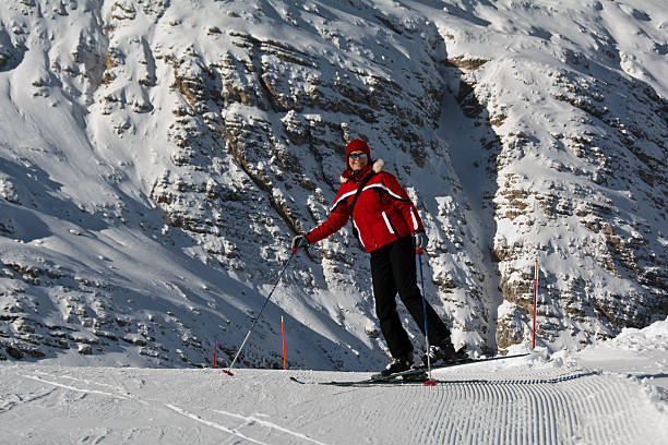 istock skier in red equipment in the Alps 612661680
