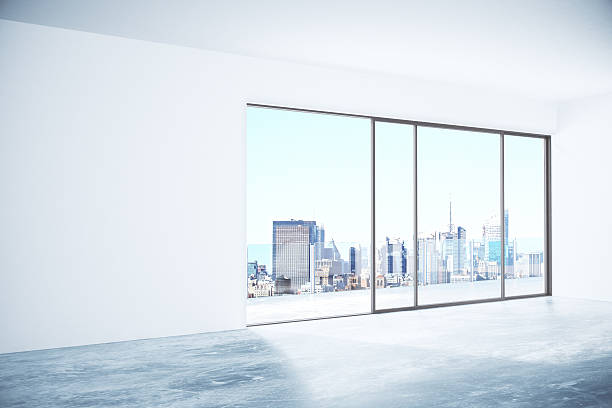 istock Concrete interior with city view 612661762