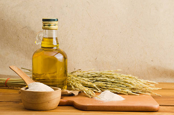 bottel of rice bran oil extracted from rice bran. Healthy for cooking.
