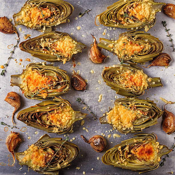 istock Artichokes baked with cheese, garlic and thyme. 612714720