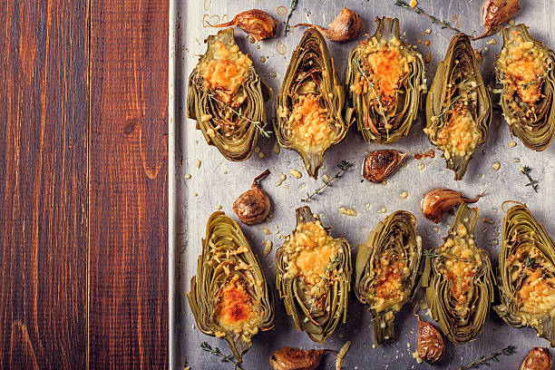 istock Artichokes baked with cheese, garlic and thyme. 612714920