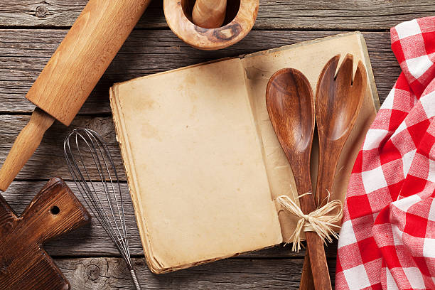 istock Blank vintage recipe cooking book and utensils 612715538