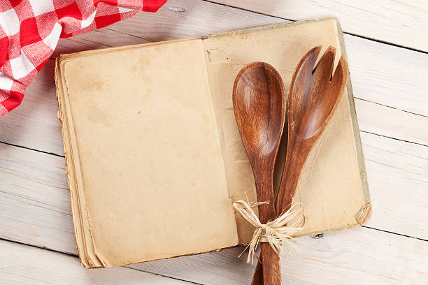 istock Blank vintage recipe cooking book and utensils 612715620