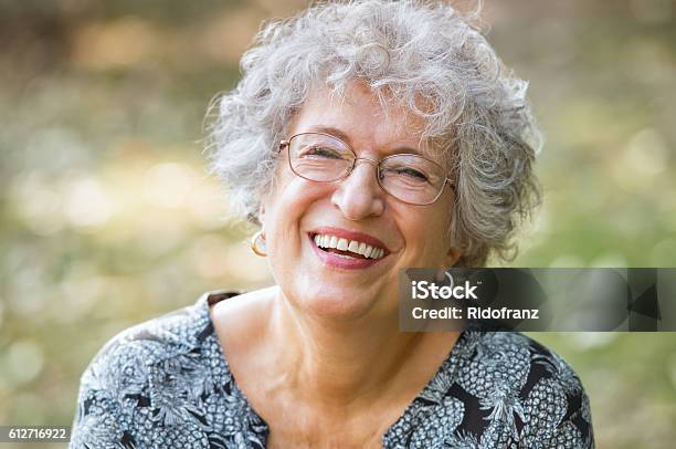 Senior Woman Laughing Stock Photo - Download Image Now - Senior Women, Senior Adult, Portrait