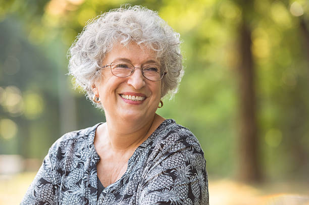istock Carefree elderly woman 612717036