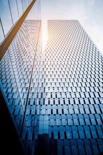 istock modern metallic skyscrapers at a sunny day,suzhou 612717412