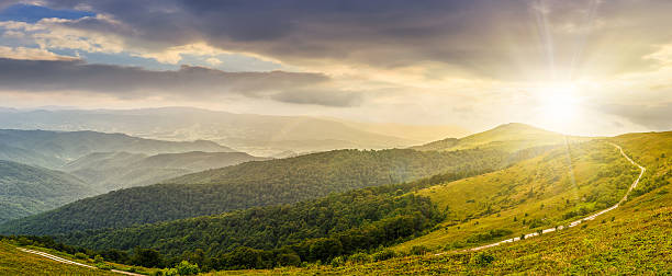 istock hillside panorama in mountains at sunset 612721748