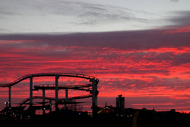 istock Sunset at the Snata Monica Pier in August 612722484