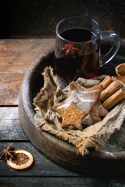 istock Hot red mulled wine with cookies 612722732