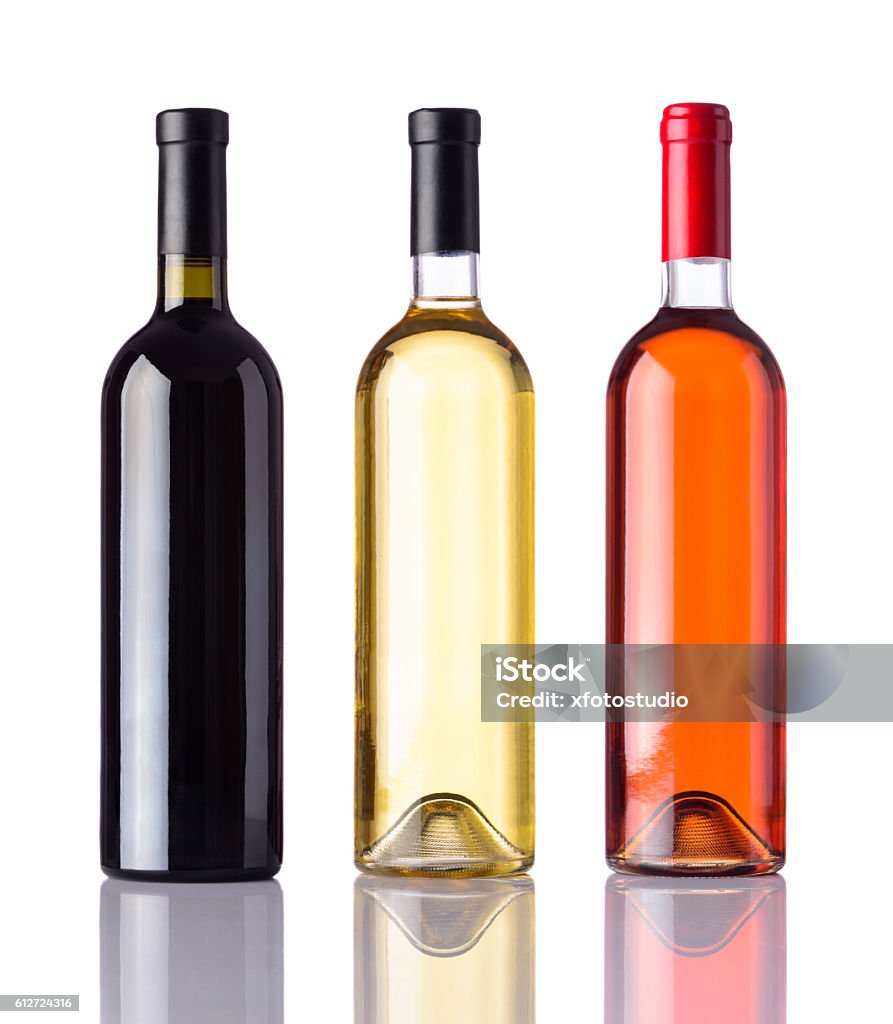 Bottles of Wine Isolated on White Background Different Bottles of wine isolated on white background. White, Rose and Red Wine. Wine Bottle Stock Photo